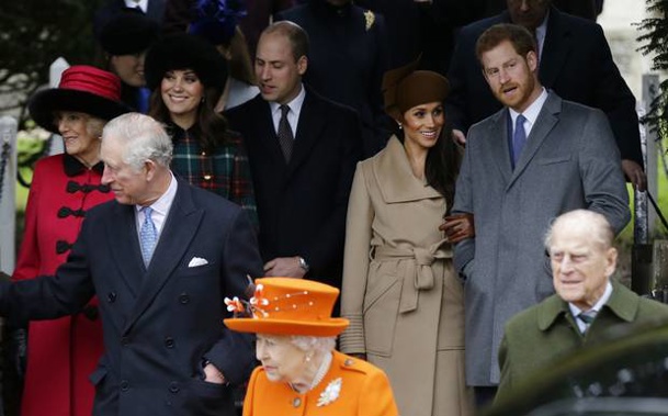 Meghan Markle and Prince Harry exiting a Christmas church service. (Photo / AP)