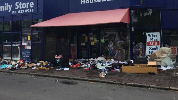 Piles of rubbish strewn about outside the New Lynn Salvation Army family store on Boxing Day. (Photo / Facebook)