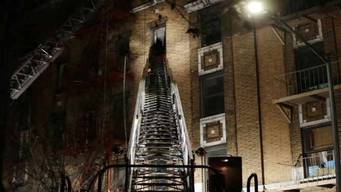 Firefighters respond to a deadly fire in the Bronx borough of New York. (Photo: AP)