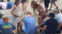 Video has emerged of the moment a reveller at Rhythm and Vines reacts after a man grabs her. (Video/Giann Reece)