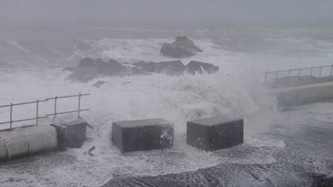 Massive swells have pushed over seawall blocks on State Highway One north of Kaikoura, delaying the road's opening (Image - NZTA)