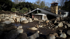 Debris from a mudslide covers a home on January 10, 2018 in Montecito, California. (Photo \ Getty Images)