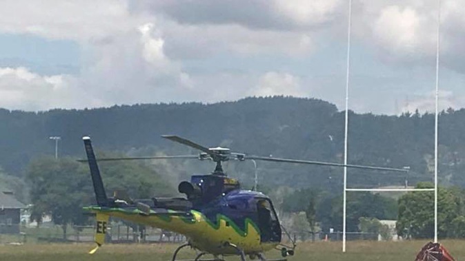 A helicopter has just arrived at the rugby club. (Photo / Victoria Logan)