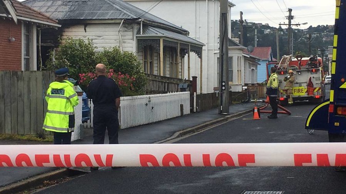 Emergency services at the scene this morning. (Photo / Stephen Jaquiery, Otago Daily Times)