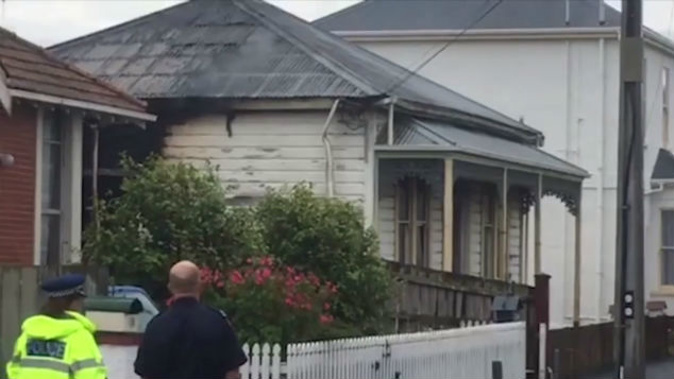 Police say two people found in a house after a fire yesterday were dead before the blaze began. (Photo: Otago Daily times)