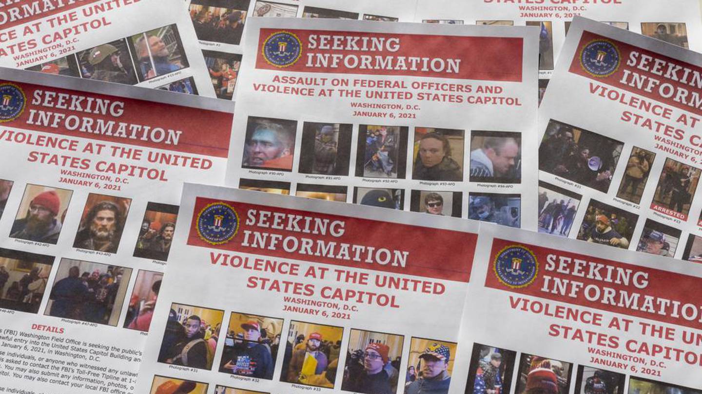 FBI fliers distributed as part of its inquiry into the riots. The US Justice Department has undertaken the largest investigation in its history. Photo / AP