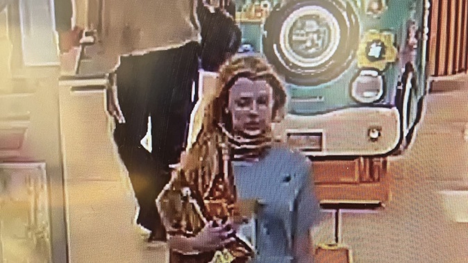 Police are asking the public to help identify this woman to assist with enquiries into an alleged assault of a Christchurch baker. Photo / Police