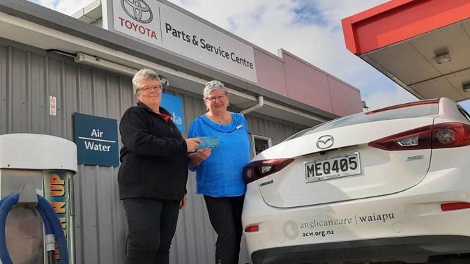 Autotech Waipukurau co-owner Karen Wilson hands a $500 voucher to Pakeke Centre manager Janette Birdsall.