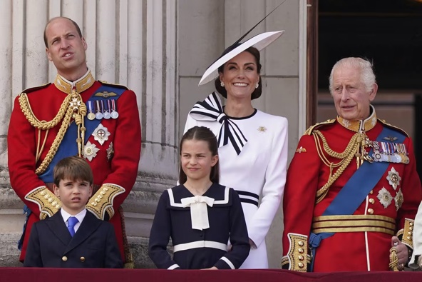 ritain's King Charles III, right, is joined by Prince William, Prince Louis, Princess Charlotte and Kate Princess of Wales on the Balcony at Buckingham Palace after attending the Trooping the Colour ceremony, in London. Photo / AP