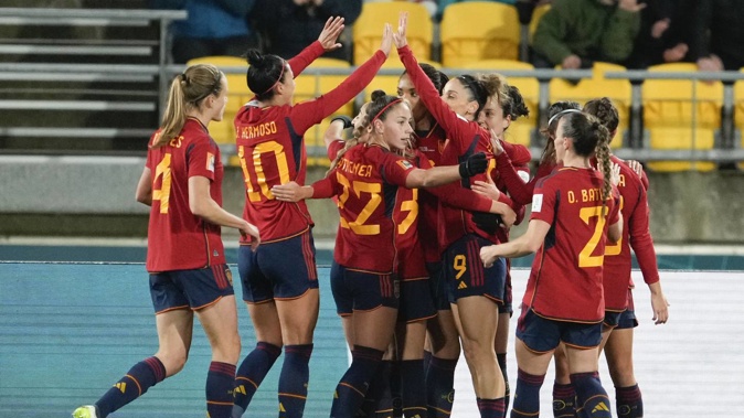 Spain celebrates after scoring their third goal against Costa Rica. Photo / AP