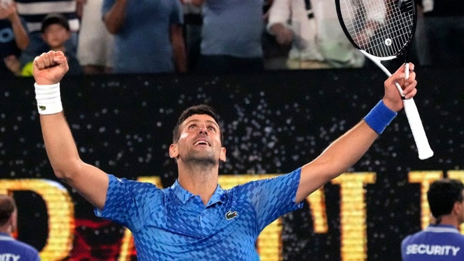 Novak Djokovic celebrates after defeating Tommy Paul of the US in their semifinal at the Australian Open. Photo / AP