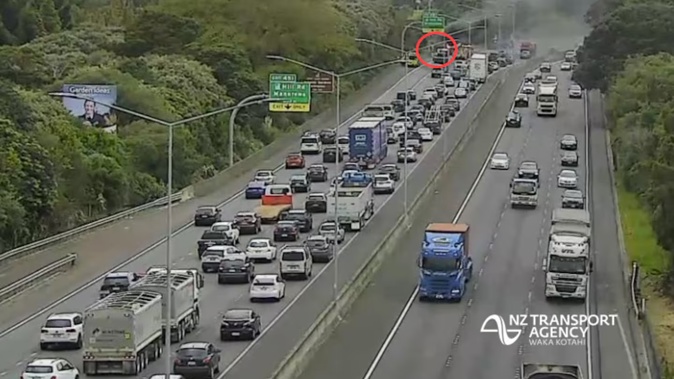 Firefighters are responding to a car fire on Auckland’s Southern Motorway that has caused an 8km backlog of southbound traffic.