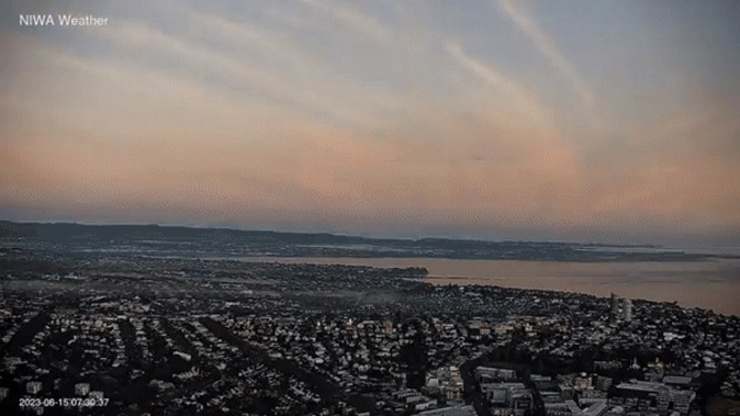 Fog rolling over Auckland Thursday morning. Photo / Niwa