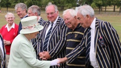 Ron Brierley in 2015 (second from right) meeting the Queen, who has accepted his resignation as a Knight. (Photo / Supplied)