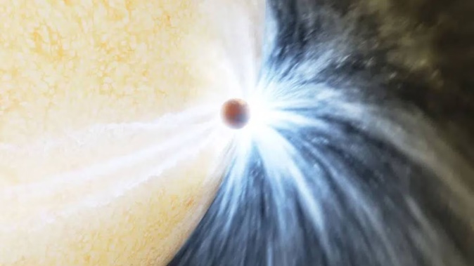 Astronomers reported their observations of what appears to be a gas giant at least the size of Jupiter being eaten by its star. Photo / AP