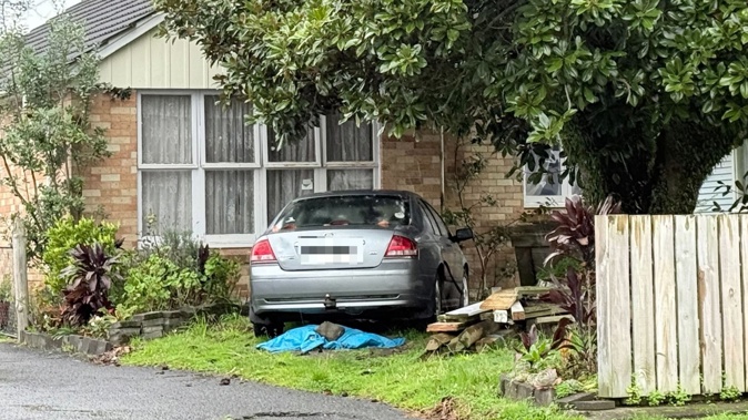 Police are investigating after a car crashed into a Fairfield, Hamilton property last night before the driver was allegedly assaulted. Photo / Malisha Kumar