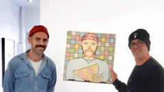 Vincent Michaelsen, of Vinci's Pizza, and Richard Boyd-Dunlop, of Boyd-Dunlop Gallery, holding an entry to the inaugural art on a pizza box competition at Boyd-Dunlop Gallery, Napier.