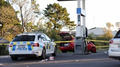 A car abandoned at the scene of the shooting. Photo / Hayden Woodward