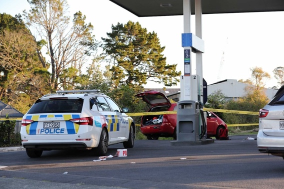 A car abandoned at the scene of the shooting. Photo / Hayden Woodward