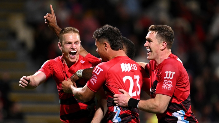 Johnny McNicholl of the Crusaders celebrates after scoring a try during the round six Super Rugby Pacific match between Crusaders and Chiefs. Photo / Getty