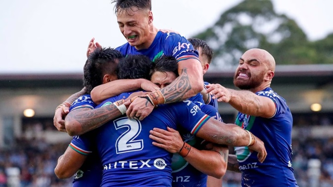 Edward Kosi celebrates with teammates after crossing against the Sharks. Photo / photosport.nz