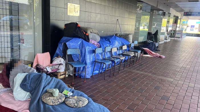 The homeless and their possessions outside the Salvation Army store on Amohia St in Rotorua. Photo / Kelly Makiha