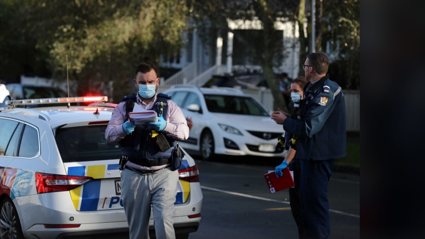 Police officers carry out investigations at Cockburn St in Grey Lynn after a woman died in a violent assault on Saturday. Photo / NZME