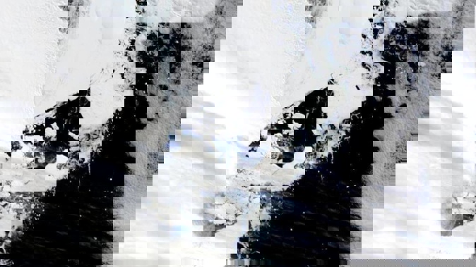 A satellite image provided by Nasa shows the original extent of C-37 through cloud next to Bowman Island. Photo / AP