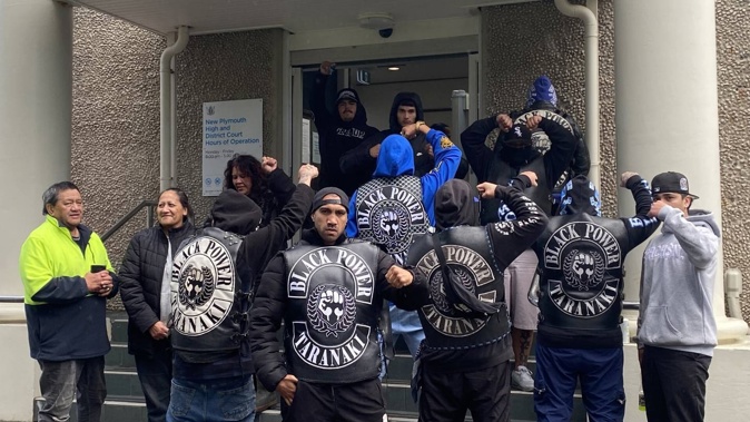 Black Power members from the Hāwera chapter gathered to support seven of its members and associates, who are not pictured, at court. Photo / Tara Shaskey