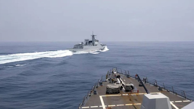 The USS Chung-Hoon observes a Chinese navy ship conduct what it called an 'unsafe' Chinese manoeuvre in the Taiwan Strait. Photo / AP