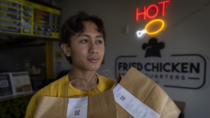 Juri Loninia of Fried Chicken Headquarters, Henderson, says every order through Uber Eats is losing him money. Photo / Michael Craig