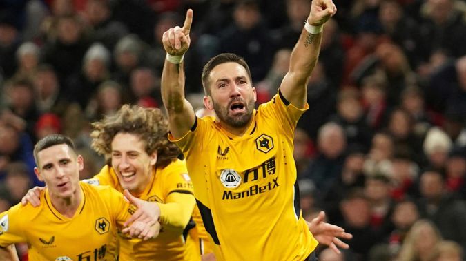 Joao Moutinho celebrates after scoring for Wolves against Manchester United. Photo / AP