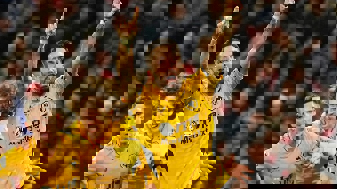 Joao Moutinho celebrates after scoring for Wolves against Manchester United. Photo / AP