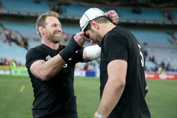 Sam Whitelock receives his 100th test cap from Kieran Read. Photo / Photosport