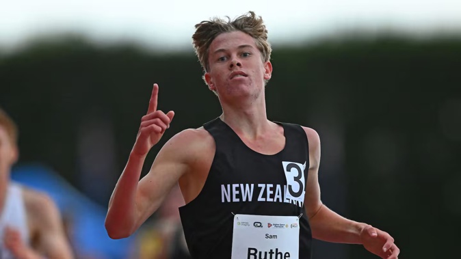 Sam Ruthe celebrates winning the men's 3000m. Photo / Photosport