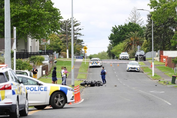 Police at Māngere East in late October after a gang member was allegedly run off his motorbike before gunshots were heard. (Photo / Hayden Woodward)