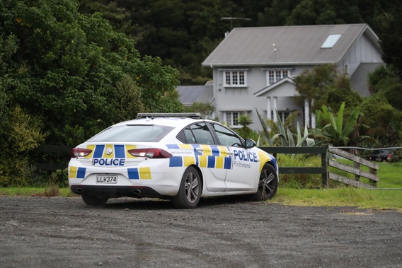 Police at the scene of an incident on Mangakura Road, Helensville. Photo / Jason Oxenham