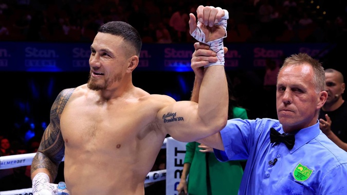 Sonny Bill Williams celebrates after knocking out Barry Hall. (Photo / Photosport)