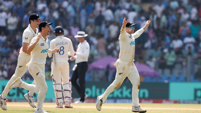 Tom Latham and his team celebrate a wicket in the third test. Photo / Photosport