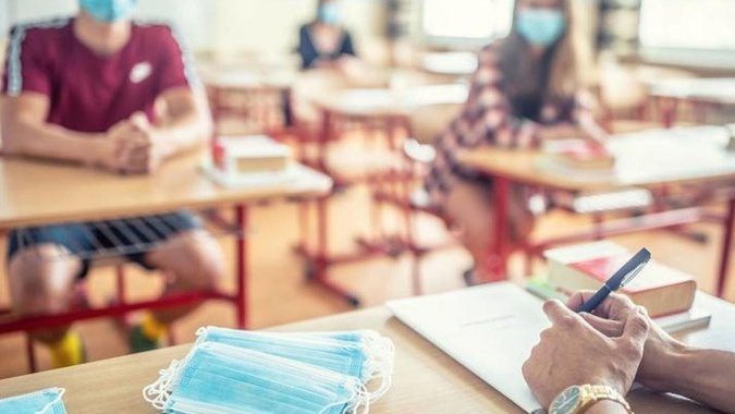 Auckland schools revert to compulsory mask-wearing after Covid surge