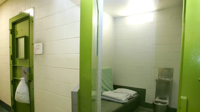 Use of force against a prisoner as he was being led from a custody cell to court was found to be "unjustified", resulting in one officer pleading guilty to an assault charge. Photo / Brett Phibbs