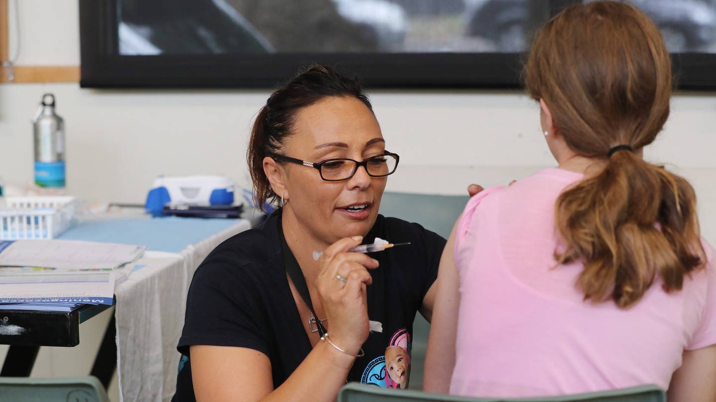 Public health nurse Sue Baker with a meningococcal immunisation. Photo / John Stone