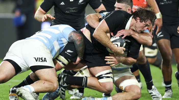 Ethan Blackadder of New Zealand is tackled during the International Test match between New Zealand All Blacks and Argentina at Sky Stadium on August 10, 2024 in Wellington, New Zealand. (Photo by Hagen Hopkins/Getty Images)