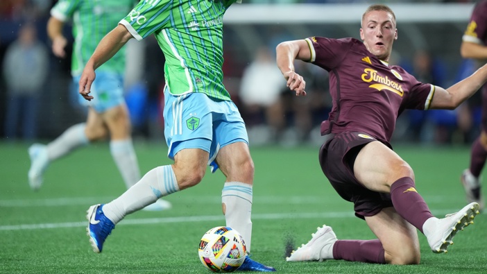 Portland Timbers defender Finn Surman (20) tries to block a shot on goal by Seattle Sounders forward Pedro De La Vega (10) during an MLS game between the Seattle Sounders and Portland Timbers on October 19, 2024 at Lumen Field in Seattle, WA. (Photo by Jeff Halstead/Icon Sportswire via Getty Images)