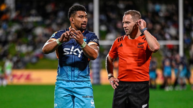 Moana Pasifika captain Ardie Savea with referee Angus Gardner. Photo / Photosport.
