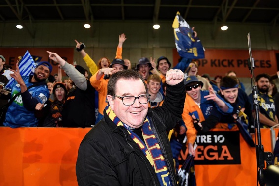 Sports Minister Grant Robertson poses for a photo with crowd members from the zoo during last year's Super Rugby Aotearoa clash between the Highlanders and Chiefs. (Photo / Photosport)