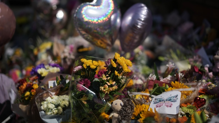 Floral tributes continue to be laid near the scene of the Southport knife attack on July 31, 2024 in Southport, England. (Photo by Christopher Furlong/Getty Images)