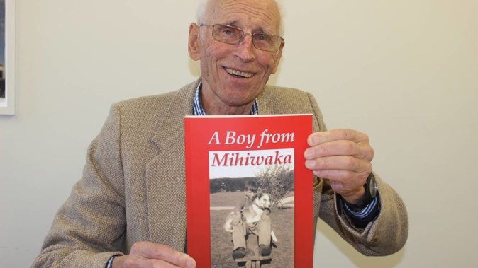 Fred Driver with a book about his life. Photo / David Haxton