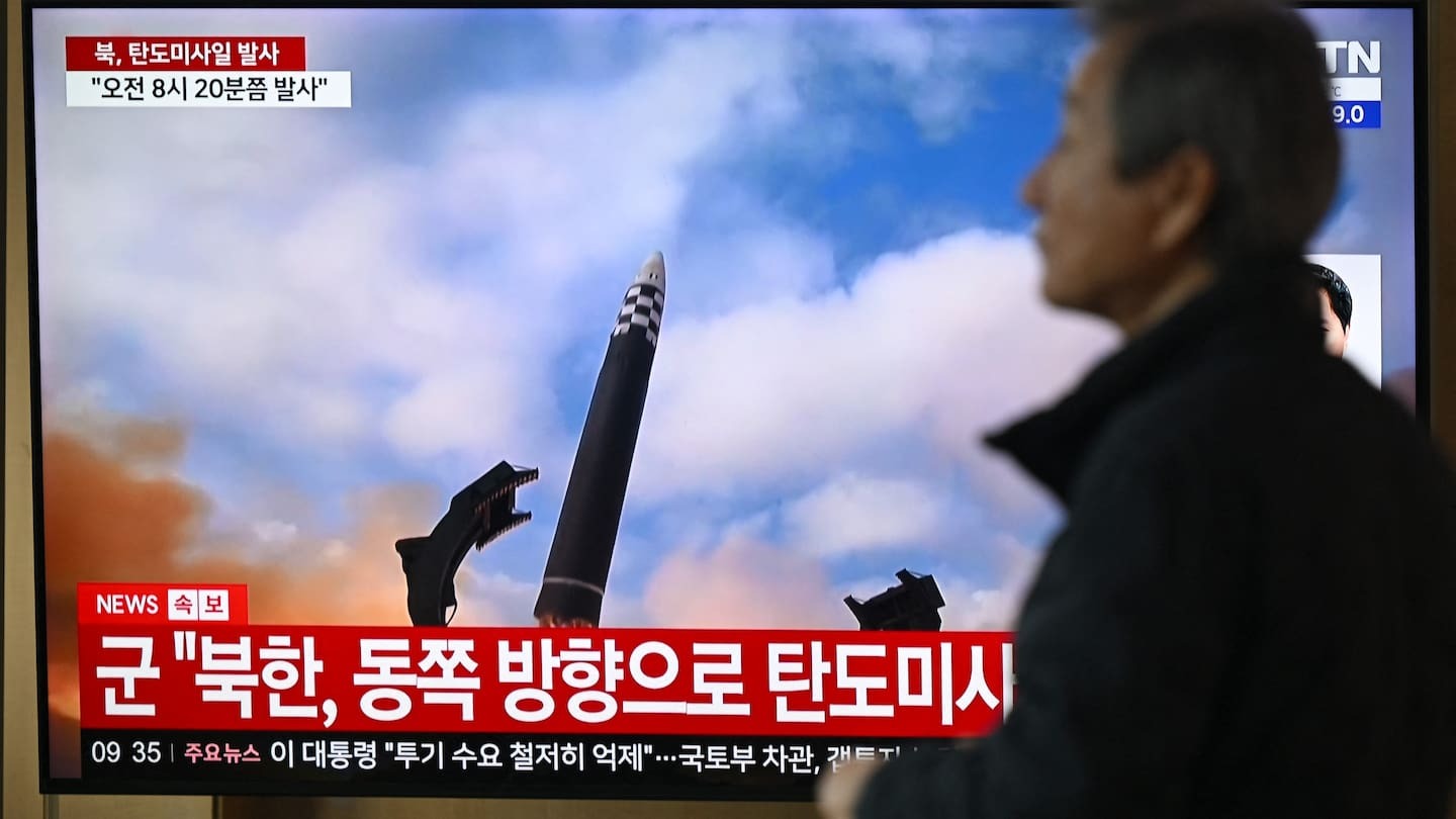 A man walks past a television screen showing a news broadcast with file footage of a North Korean missile test, at a train station in Seoul on October 22, 2025. North Korea fired at least one ballistic missile on October 22, Seoul's military said, its first such launch in months. Photo / Jung Yeon-je, AFP