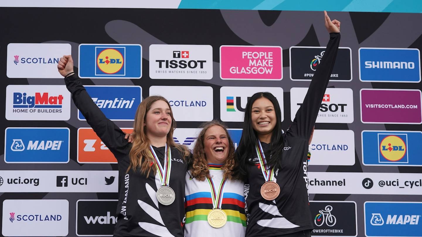 New Zealand dominate the podium in the women's junior downhill. From left: Poppy Lane, Erice Van Leuven and Sacha Earnest. Photo / UCI